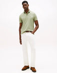 polo-tommy-hilfiger-vert-homme-porte