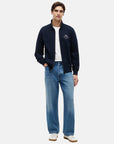 sweat-zippe-tommy-hilfiger-marine-porte