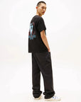 t-shirt-tommy-jeans-noir-homme-profil