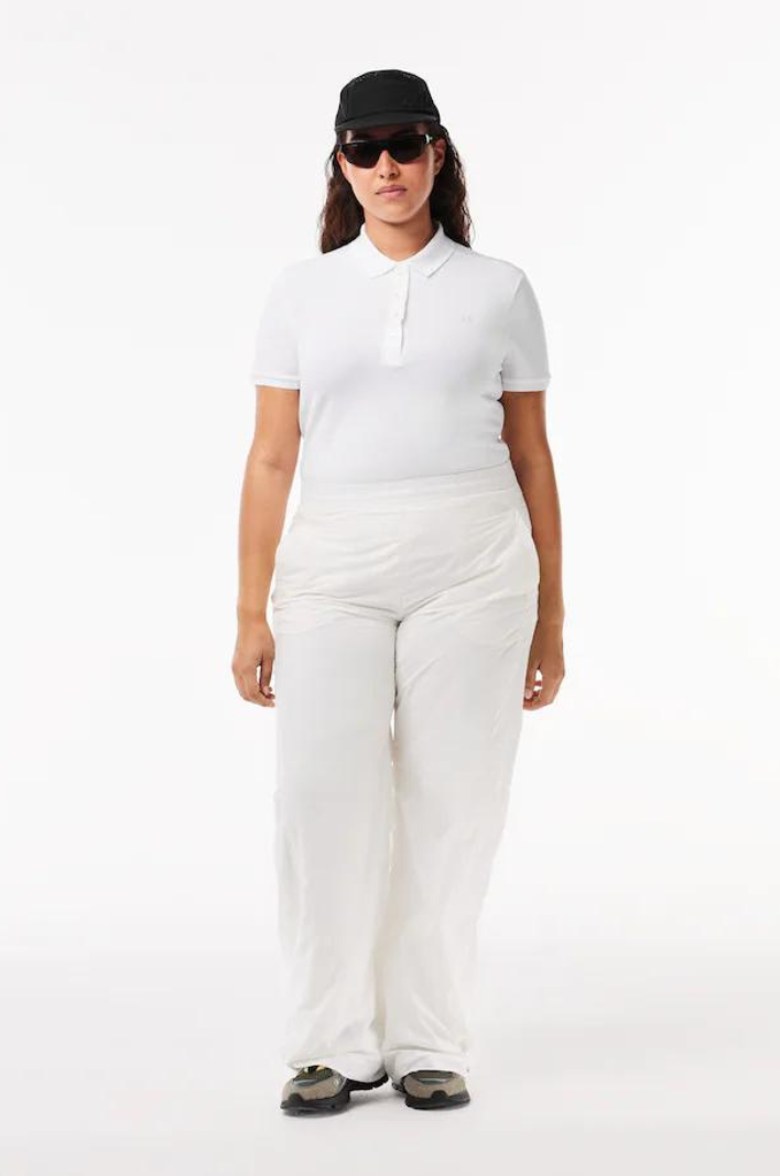 Polo femme Lacoste cintré blanc en coton stretch