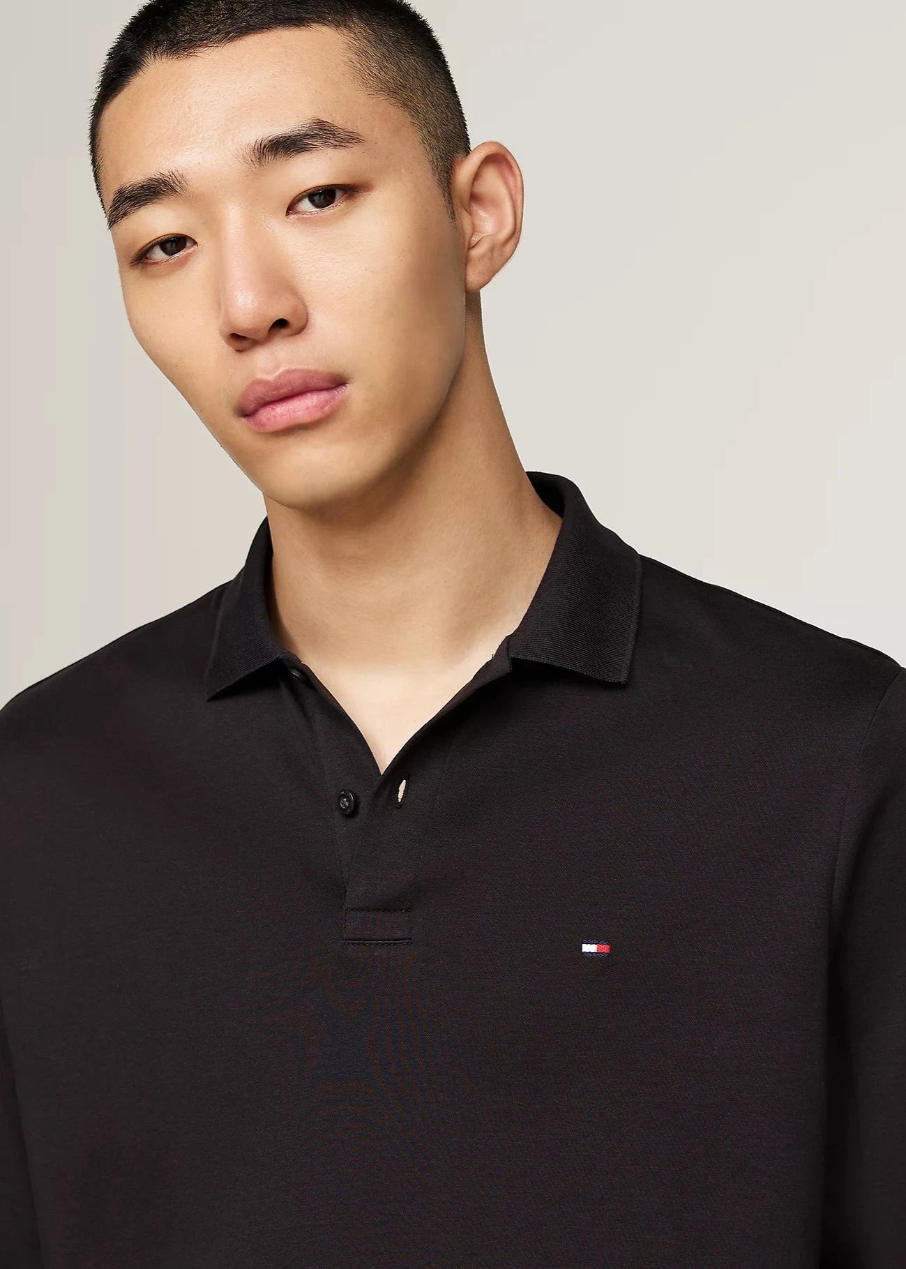 Polo manches longues Tommy Hilfiger noir | Georgespaul