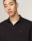 Polo manches longues Tommy Hilfiger noir | Georgespaul