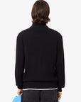 Pull camionneur Lacoste noir homme | Georgespaul    