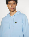 Sweat zippé à capuche Lacoste bleu clair - Georgespaul