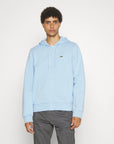 Sweat zippé à capuche Lacoste bleu clair - Georgespaul