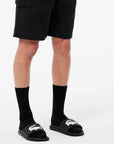 claquettes-lacoste-noires-homme-49cma0038312-porte