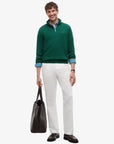 pull-camionneur-tommy-hilfiger-vert-MW0MW28049MQ7-porte