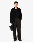 pull-lacoste-laine-noir-homme-porte