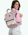 sac-dos-adventurer-cabaia-Scilla-femme-rose-porte
