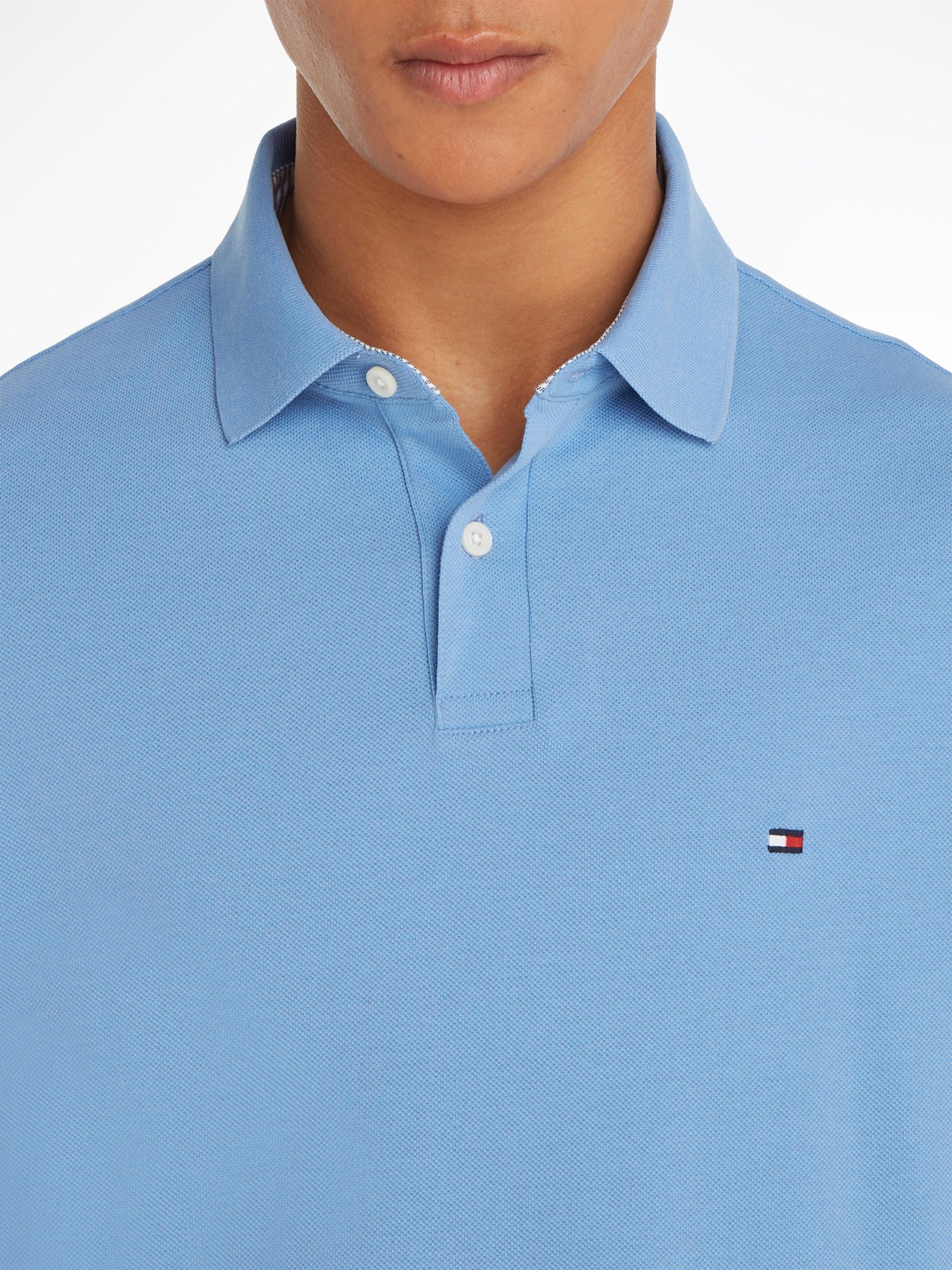 Polo 1985 homme Tommy Hilfiger bleu en coton bio stretch | Georgespaul