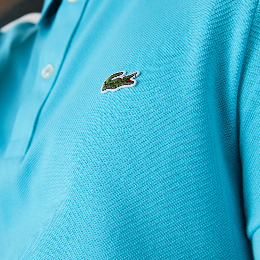 Polo homme Lacoste ajusté bleu turquoise en petit piqué | Georgespaul