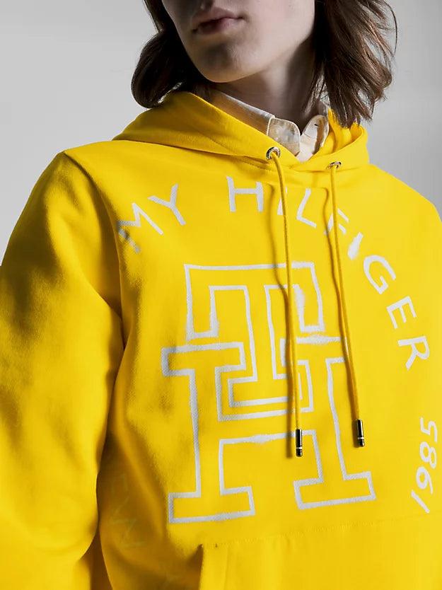 Sweat à capuche monogramme Tommy Hilfiger jaune en coton bio - Georgespaul