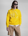 Sweat à capuche monogramme Tommy Hilfiger jaune en coton bio - Georgespaul